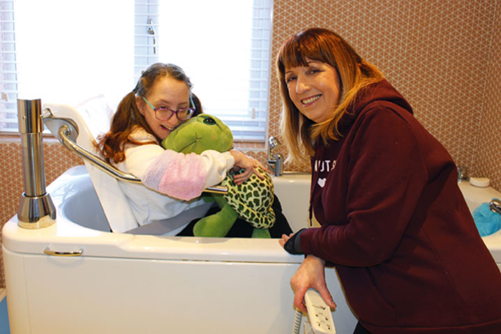 Karis in the Scorpio bath with Karen mum