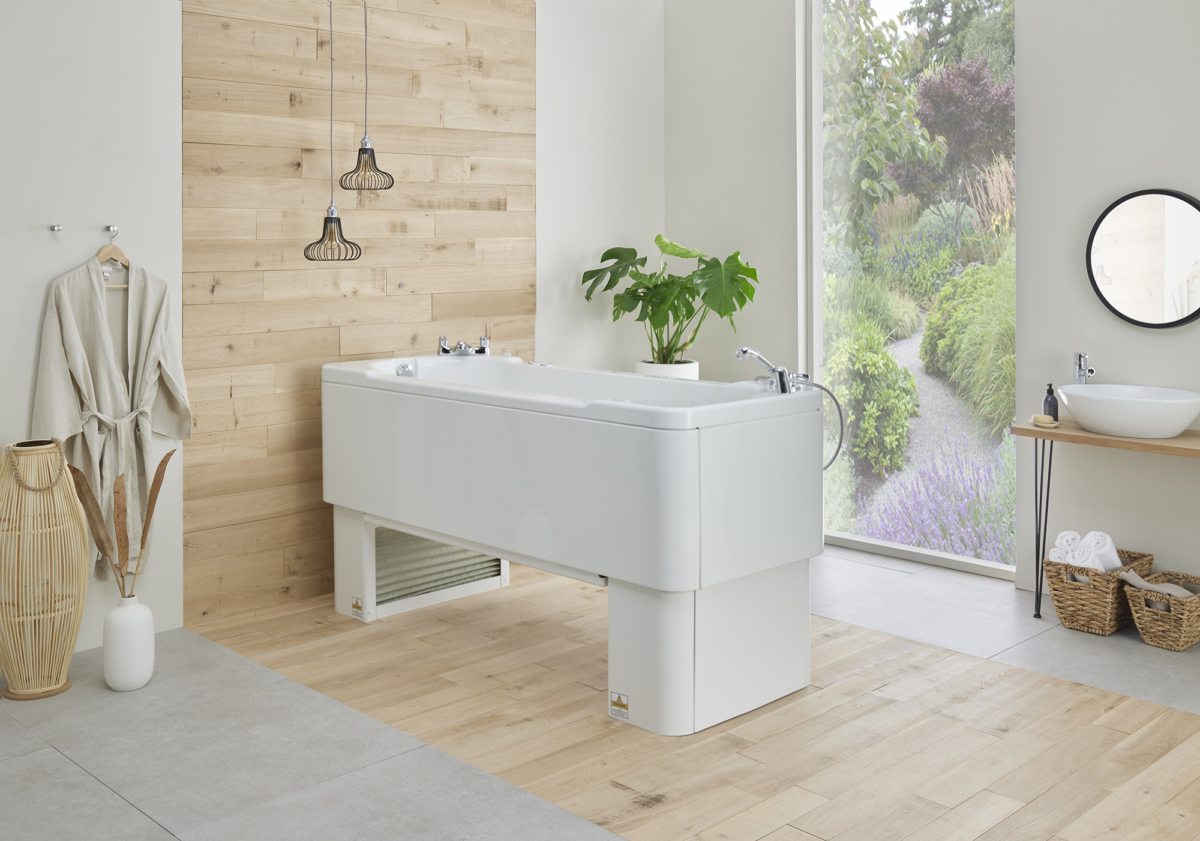 Aries adjustable height bath in raised position